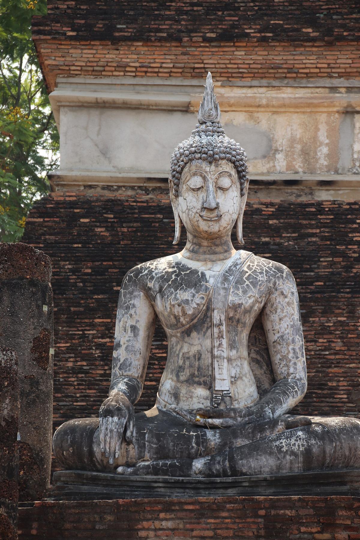 Sukhothai Buddha statue sunrise